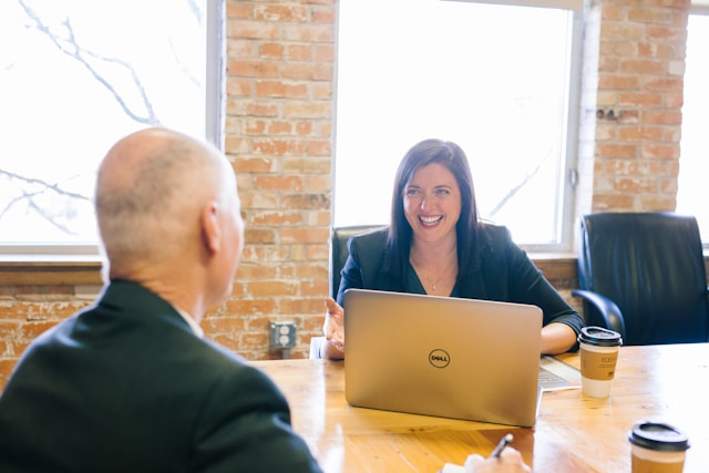 woman happy with computer